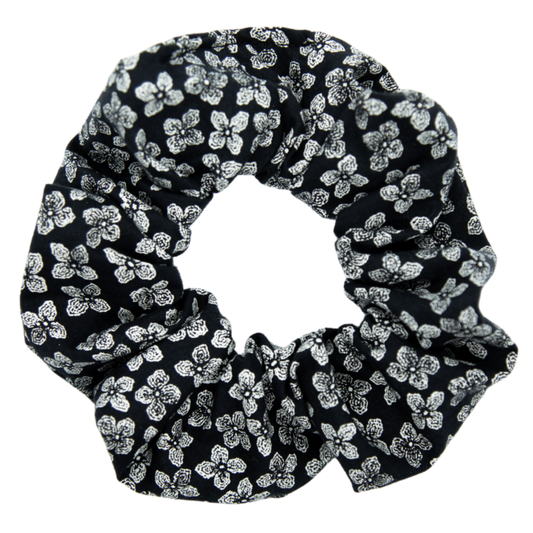 white flower black scrunchie